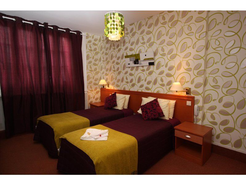 Hotel Raymond 4 Тулуза Стая снимка